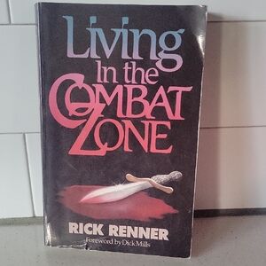 Living in the Combat Zone Paperback Book By Rick Renner